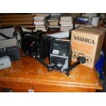A quantity of projectors and a Yashica 8mm editor.