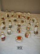 21 pieces of assorted crested china, all in good condition.