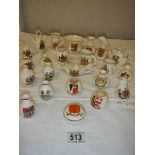 21 pieces of assorted crested china, all in good condition.