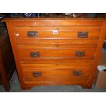 A 3 drawer satin walnut chest.