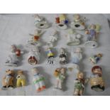 Approximately 19 mid 20th century miniature figures.
