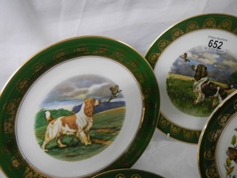 Ten collector's plates depicting dogs and other animals. - Image 3 of 5