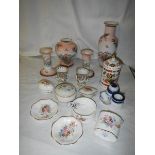 A mixed lot of interesting ceramics including candlesticks, vase, pill boxes etc.