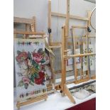 A selection of tapestry frames, embroideries etc.