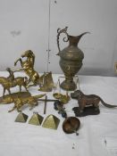A mixed lot of brassware including dog nut cracker, rearing horse, dog, balance scales etc.