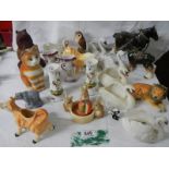 22 ceramic items including bisque swans, candlesticks etc.