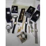 A good lot of Ladies and Gents watches including a 2 piece clock.