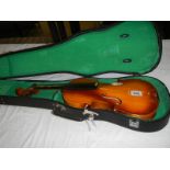 A late 20th century cased violin, a/f.