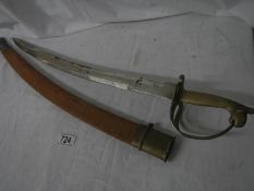 An Indian cutlass in scabbard.