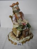 A Capo di Monte style figure of a cobbler, 32 cm tall.