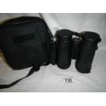 A cased pair of Viking 8 x 24 binoculars.