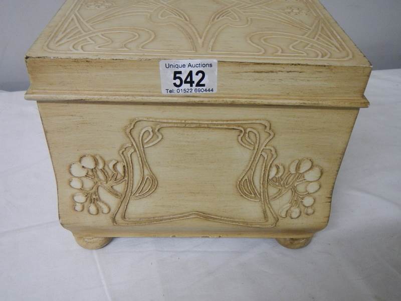 A good quality Macintosh style jewellery box, 24 cm 2ide, 20 cm deep, 20 cm high.