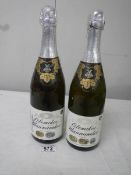 2 bottles of vintage Russian champagne.