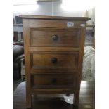 An oak 3 drawer chest.