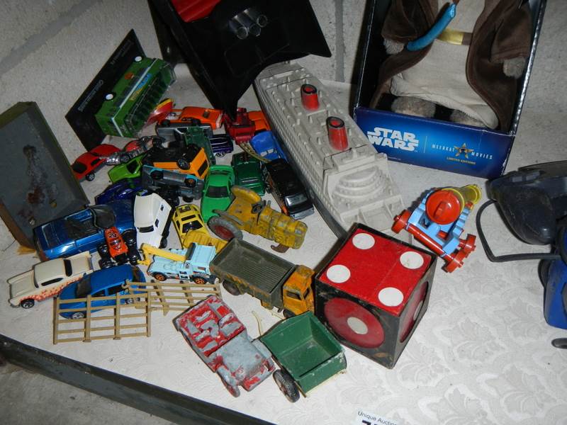 A good lot of play worn cars, toys,