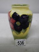 A Moorcroft vase, 13 cm, unfortunately badly cracked (see images).