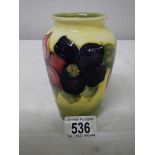 A Moorcroft vase, 13 cm, unfortunately badly cracked (see images).