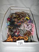 A large mixed lot of costume jewellery.