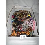 A large mixed lot of costume jewellery.