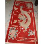 A dragon patterned Chinese rug.