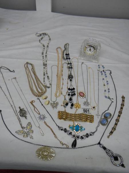 A good mixed lot of costume jewellery including a glass clock, 25 items.