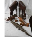 A mixed lot of wooden items including 45 cm long crocodile and 36 cm tall antelope.