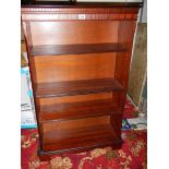 A mahogany book case.