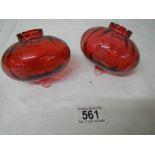 2 cranberry glass peg oil lamp fonts in good condition.