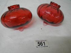 2 cranberry glass peg oil lamp fonts in good condition.