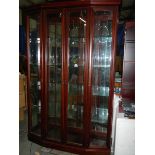 A superb quality glazed cabinet with etched glass doors.