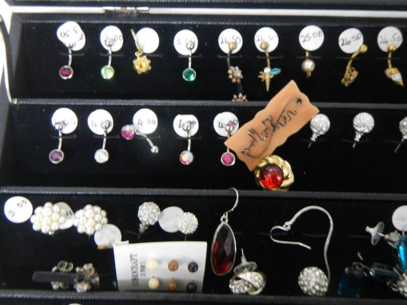 A cabinet of pairs and single earrings. - Image 3 of 5