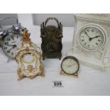 A small lot of assorted mantel clocks including brass lantern clock (bell present but not fitted).