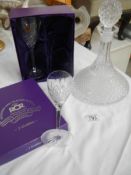 A good quality sherry decanter and 2 lead crystal goblets.