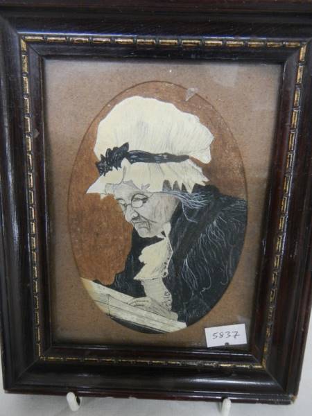 A framed watercolour portrait of an elderly lady, signed W Hill.