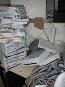 A massive collection of Wii games, fit boards, controllers, chargers etc.