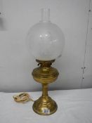 A brass half Nelson style electric table lamp complete with shade but needs plug.