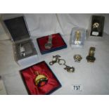 A quantity of ladies and gents wrist watches, miniature ball clock etc.