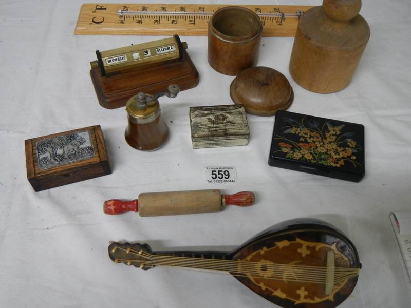 A mixed lot including match holder, perpetual calendar, thermometer, etc.