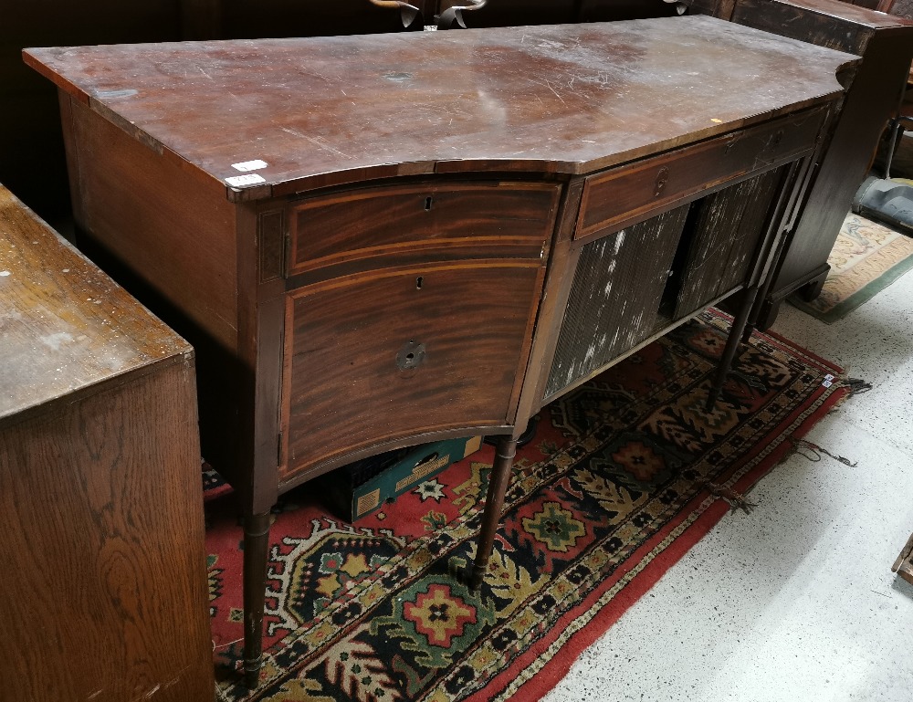 For restoration – a long Georgian Mahogany Sideboard Frame, inlaid, on turned and reeded legs with a