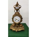 Ormolu Gilt framed Mantle Clock, late 19thC, with an ornate classical finial in the form of an urn
