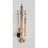 Bronze 4-piece companion set on an original stand. 68cm high good polished condition