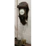 Reproduction Dutch style 2 train wall clock, 2 brass weights, decorative brass finial