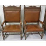 Matching Pair of Large Continental Oak Throne Armchairs, covered with brown leather, with ball-