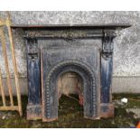 Victorian Cast Iron Fireplace, decorated with corbels, with an insert, 4ft wide x 56”w, painted