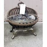 A small cast iron fire grate and a beetle shaped boot rack (2)