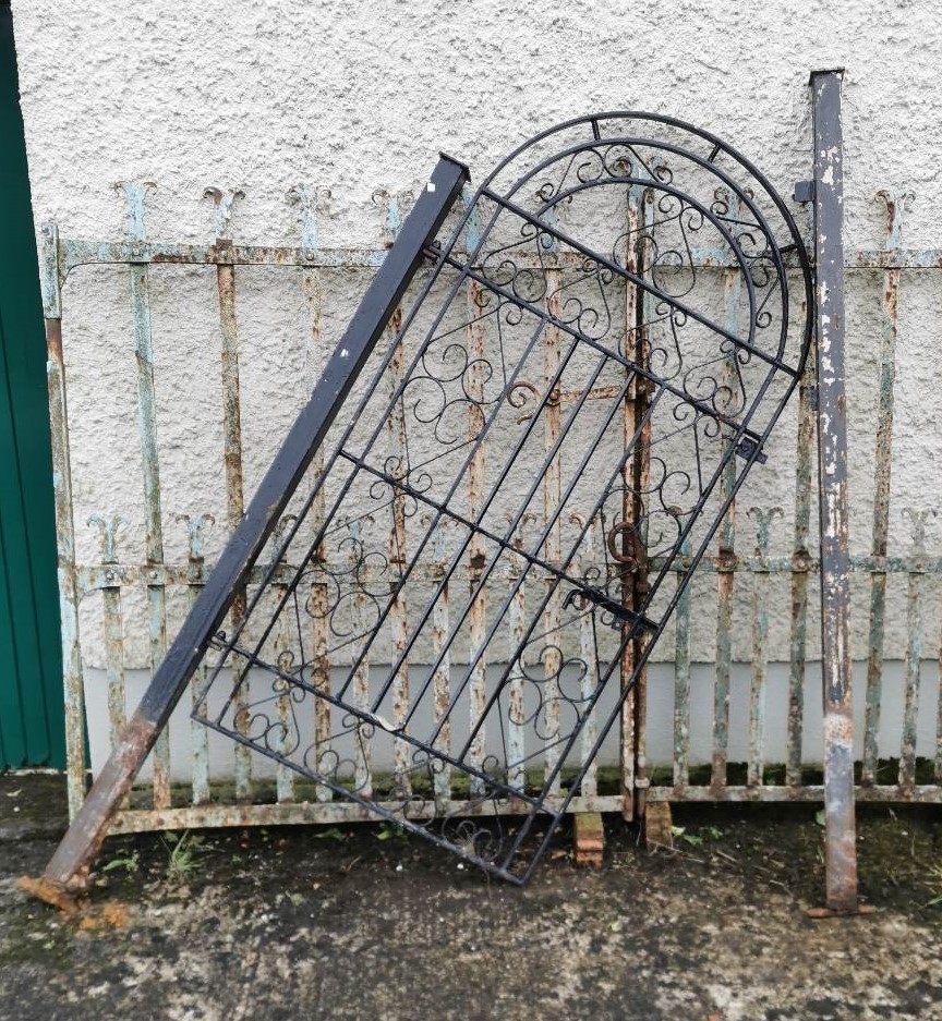 Wrought Iron Garden Gate, painted black, with an arched top and a pair of side pillars, 3ft wide