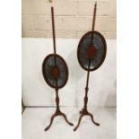 Matching Pair of mid 19thC Mahogany Pole Screens - oval shaped – with cane inserts, on tripod bases,