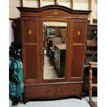 Edw. Mahogany Wardrobe, with a single mirror door enclosing a hanging rail, sunburst inlay, 138cmW x
