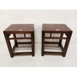 Pair of Chinese low rectangular lamp tables in square supports with stretchers, 18insH x 15ins x