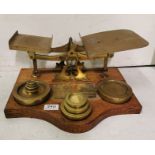 Brass Parcel Post Weighing Scales with ½ oz - 4lb weights, on an oak base